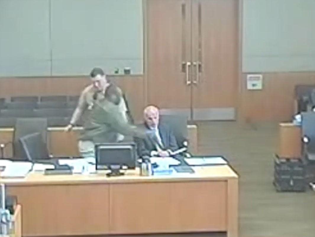 Lamont Payne sucker-punches attorney Vladimir Gagic: Screengrab Maricopa County Superior Court