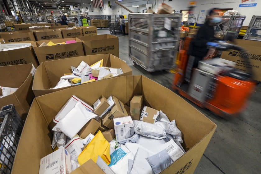 CITY OF INDUSTRY, CA - MAY 14: A look at workings of USPS Processing & Distribution Center on Thursday, May 14, 2020 in City of Industry, CA. (Irfan Khan / Los Angeles Times)