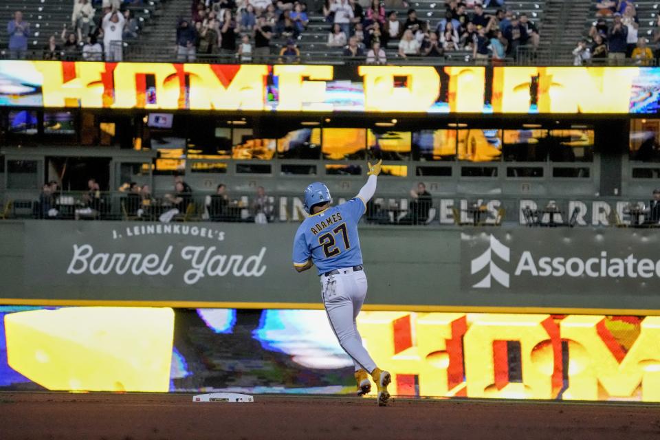 Milwaukee Brewers' Willy Adames reacts after hitting a home run during the first inning of a baseball game against the Baltimore Orioles Wednesday, June 7, 2023, in Milwaukee. (AP Photo/Morry Gash)