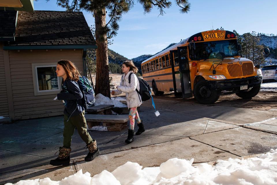 Kids arrive by bus at Stove Prairie Elementary School in Bellvue on Nov. 28.