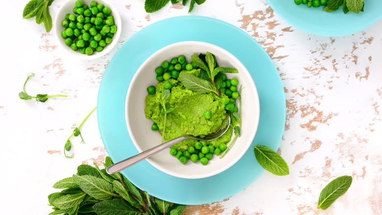 bowl of pesto and mint leaves