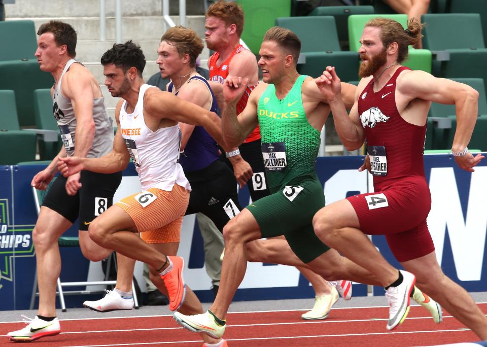 Oregon's Max Vollmer, center, competes in the decathlon 100 meters on the first day of the NCAA Outdoor Track & Field Championships Wednesday June 8, 2022 at Hayward Field in Eugene, Ore.