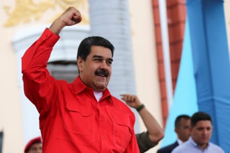 Venezuela's President Nicolas Maduro gestures during an event with students at Miraflores Palace in Caracas, Venezuela November 21, 2017. Miraflores Palace/Handout via REUTERS