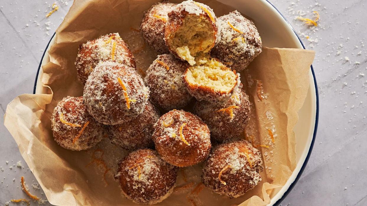 italian ricotta donuts tossed in orange sugar