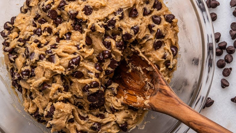 Stock photo of chocolate chip cookie dough in a mixing bowl