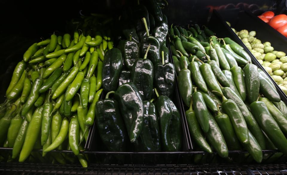 Besides premium meats, Toro Meat Market features a large produce section, which includes these serano, poblano and jalapeno peppers.