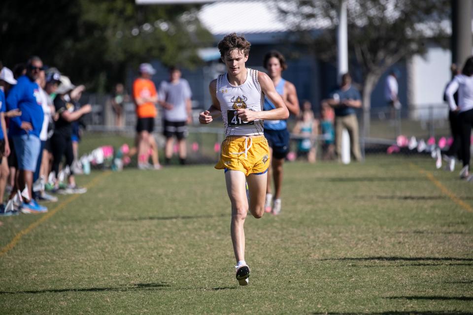 Andrew Marino of Bishop Verot finishes in second place at the 2A Region 3 Cross Country Championships on Thursday, Nov. 9, 2023, at Buckingham Community Park in Fort Myers. Bishop Verot also won the team competition.
