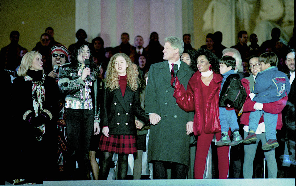 Washington,DC 1-18-1993 Michael Jackson on stage with Diana Ross and the new president William Clinton and Vice-President Albert Gore Jr. L-R Hillary Clinton, Stevie Wonder, Michael Jackson, Chelsea Clinton, President WIlliam Clinton, Diana Ross, Credit: Mark Reinstein (Photo by Mark Reinstein/Corbis via Getty Images)