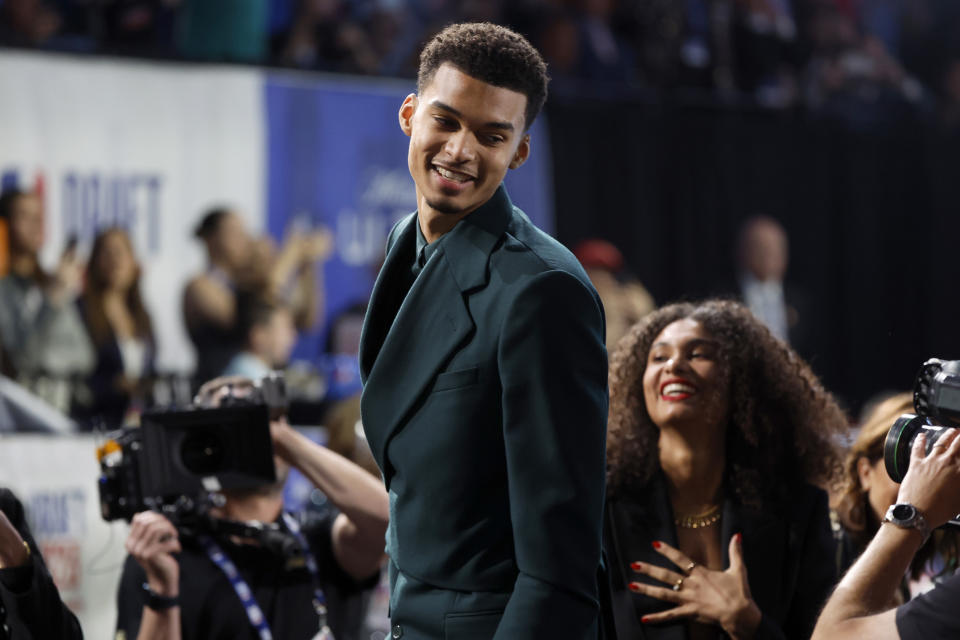 Victor Wembanyama celebrates after being drafted first overall by the San Antonio Spurs during the 2023 NBA Draft at Barclays Center in New York City on June 22, 2023. (Sarah Stier/Getty Images)