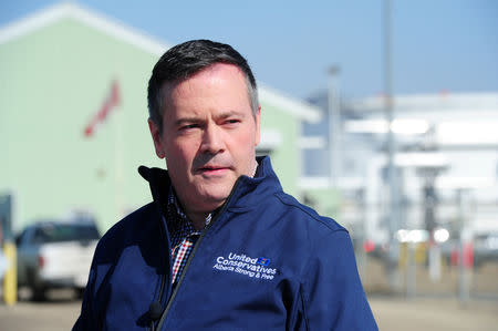 FILE PHOTO: United Conservative Leader Jason Kenney details the "UCP Fight Back Strategy" against foreign anti-oil special interests, in front of the Trans Mountain Edmonton Terminal in Edmonton, Alberta, Canada, March 22, 2019. REUTERS/Candace Elliott