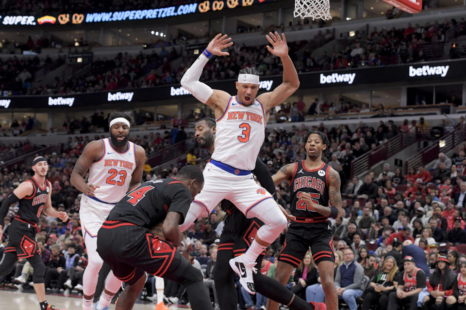 New York Knicks Josh Hart (3) was ejected from the game after kicking Chicago Bulls Javonte Green (24) the head during the first quarter of an NBA basketball game in Chicago, Friday, April 5, 2024. (AP Photo/Mark Black)