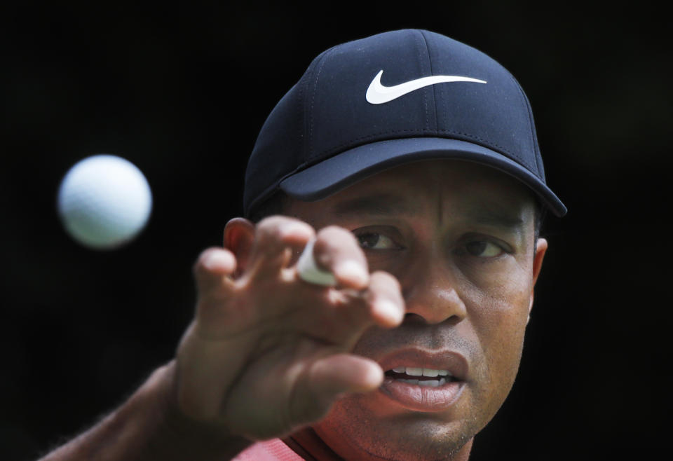 Tiger Woods ran into a lot of trouble on the 15th and 16th holes on Saturday. (AP Photo)