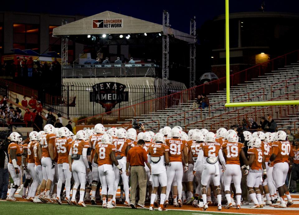 The Longhorn Network set near the south endzone at Darrell K Royal - Texas Memorial Stadium overlooks the UT football gathering to warm up before the Texas Tech game on Thursday November 28, 2013. JAY JANNER / AMERICAN-STATESMAN