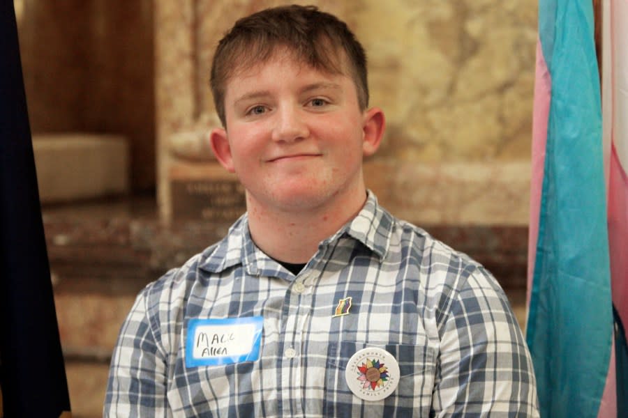 Mack Allen, of Leavenworth, Kan., poses following a rally for LGBTQ youth at the Statehouse, Wednesday, Jan. 31, 2024, in Topeka, Kan. A Kansas law enacted in 2023 ended the state’s legal recognition of transgender identities, and now other states are considering such laws. (AP Photo/John Hanna)