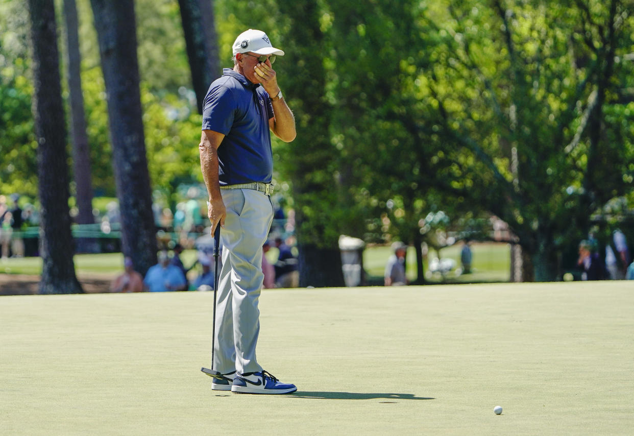 Apr 13, 2024; Augusta, Georgia, USA; Phil Mickelson reacts to a putt on No. 4 during the third round of the Masters Tournament. Mandatory Credit: Katie Goodale-USA TODAY Network