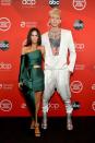 <p>Let's throw it back to one of Megan and Machine Gun Kelly's first red carpet appearances together, where the actor opted for a forest green Azzi & Osta top and skirt combo with chunky chain embellished heels.</p>