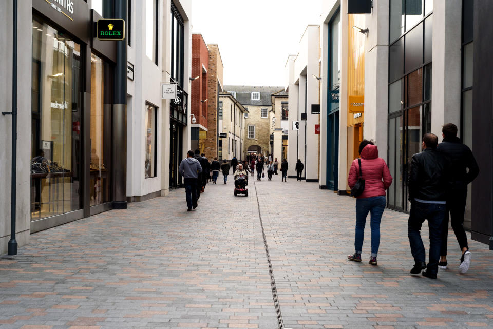 Shoppers during the daytime walking through the newly constructed Bond Street