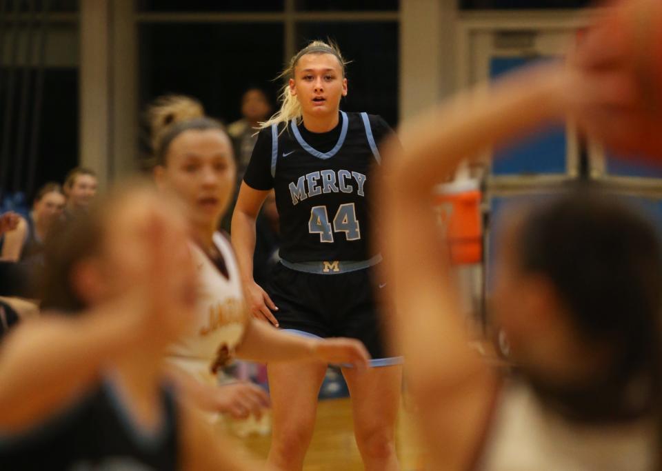 Mercy’s Leah Macy gets back on defense after scoring the basket against Cooper. Jan. 27, 2023