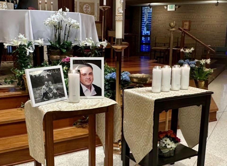 A memorial for Joshua Barrick is on display, late Monday, April 10, 2023, at Holy Trinity Catholic Church in Louisville, Ky. A Louisville bank employee opened fire at the bank Monday morning, killing Barrick and four others.