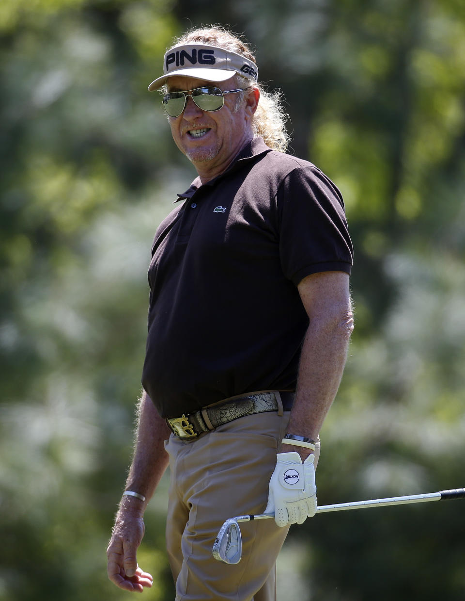 Miguel A. Jimenez watches his shot from the tee on the second hole during the final round of play in the Greater Gwinnett Championship golf tournament of the Champions Tour, Sunday, April 20, 2014, in Duluth, Ga. (AP Photo/John Bazemore)