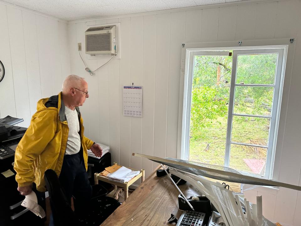 Paul Feinsinger on June 12, 2024, shows damage to the inside of his business at Dixie Highway and Southeast Anstis Place in Hobe Sound after what he thought was a tornado came through.