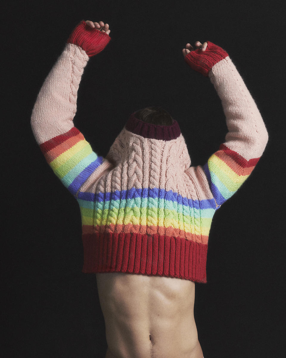 Tom Daley wears a cropped sweater designed for an Ami Paris Pride fundraiser. - Credit: Courtesy of Ami Paris