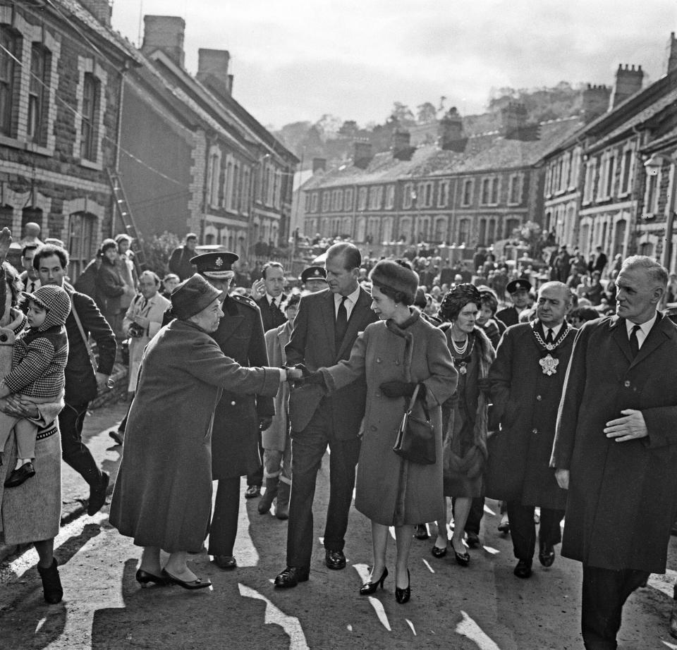 Queen Elizabeth II and the Duke of Edinburgh visit the coal mining village of Aberfan in Wales, following the disaster which resulted in the deaths of 116 children and 28 adults, UK, 29th October 1966.