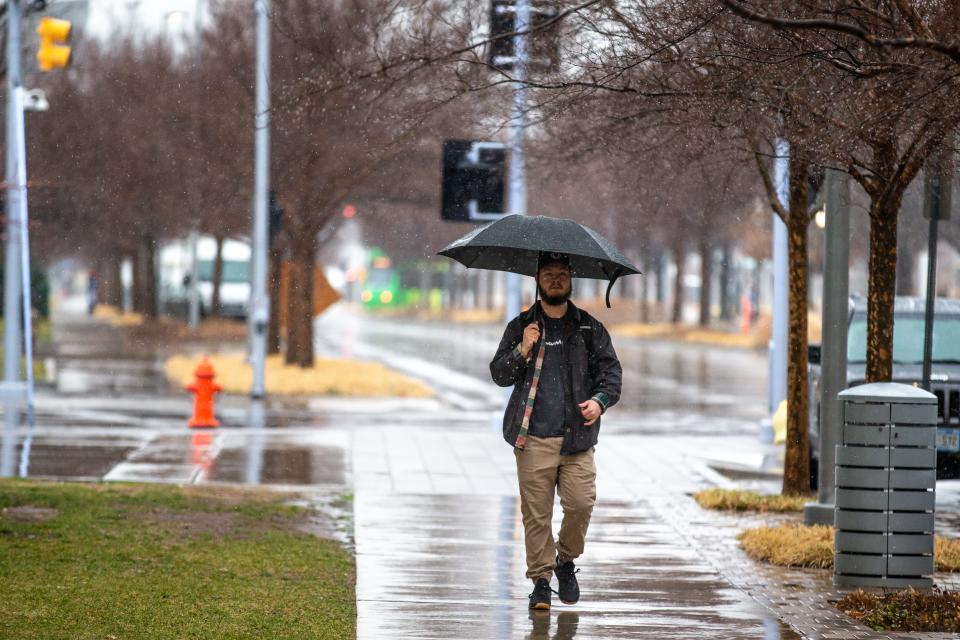 Rain and snow flurries hit downtown Oklahoma City on Tuesday.