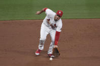 St. Louis Cardinals third baseman Nolan Arenado fields a ground ball by Pittsburgh Pirates' Jacob Stallings during the third inning of a baseball game Friday, June 25, 2021, in St. Louis. (AP Photo/Joe Puetz)