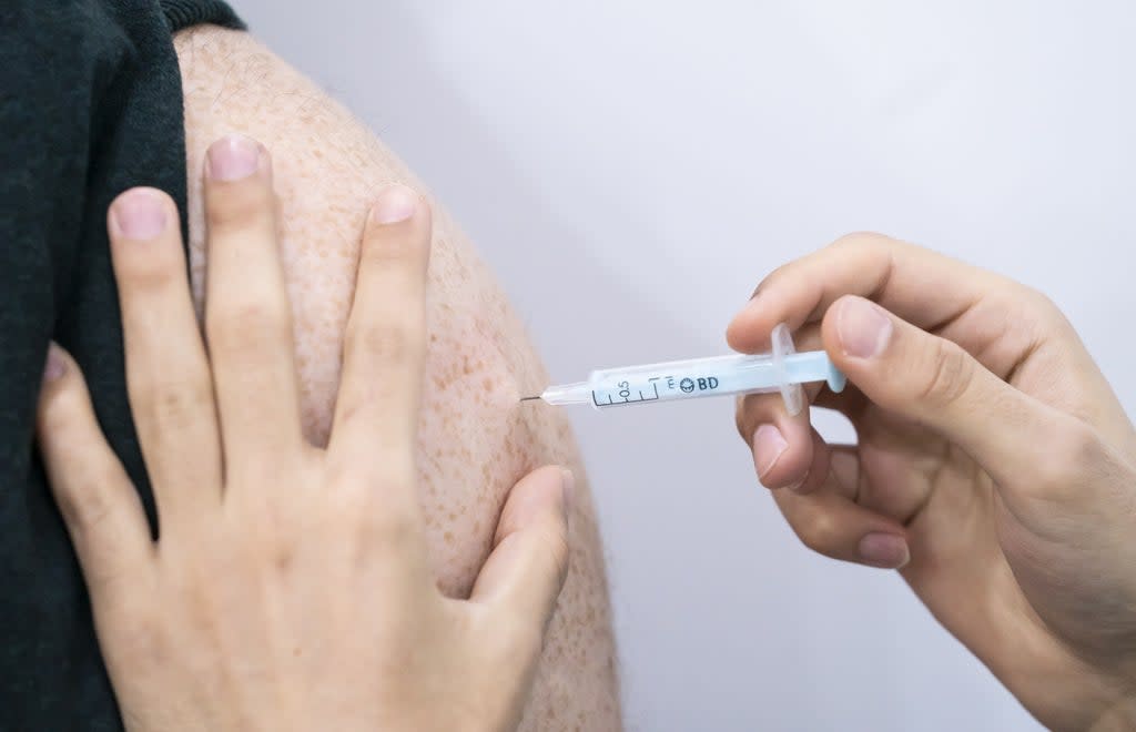 A booster coronavirus vaccine is administered at a Covid vaccination centre at Elland Road in Leeds, as the booster vaccination programme continues across the UK (Danny Lawson/PA) (PA Wire)