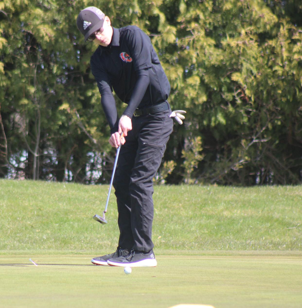 Cheboygan junior Tristan Stead watches his putt during Monday's Cheboygan Invitational.