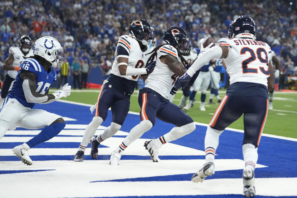 Chicago Bears linebacker Tremaine Edmunds (49) intercepts a pass in the end zone in front of Indianapolis Colts wide receiver Ashton Dulin (16) during the first half of an NFL football game Sunday, Sept. 22, 2024, in Indianapolis. (AP Photo/Michael Conroy)