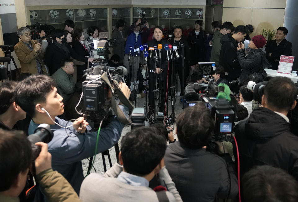 Hwangbo Kwan, top center, technical director of the Korea Football Association (KFA), speaks during a press conference after a meeting to assess South Korea's men's national team's performance at the recent Asian Football Confederation Asian Cup at the KFA headquarters in Seoul, South Korea, Thursday, Feb. 15, 2024. KFA officials have recommended Jurgen Klinsmann be fired as head coach of the South Korean national team after an Asian Cup semifinal exit and reports of infighting among star players. (AP Photo/Ahn Young-joon)