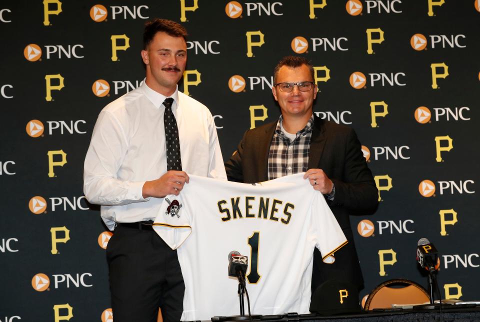 Pittsburgh Pirates pitcher Paul Skenes (left) is introduced at a press conference by Pirates General Manager Ben Cherington (right) before the Pirates play the Cleveland Guardians at PNC Park on Tuesday.