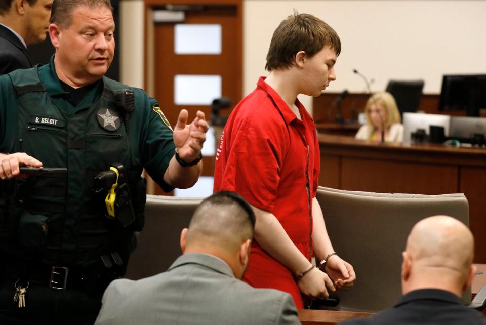 Aiden Fucci is led into the courtroom start his sentencing hearing (AP)