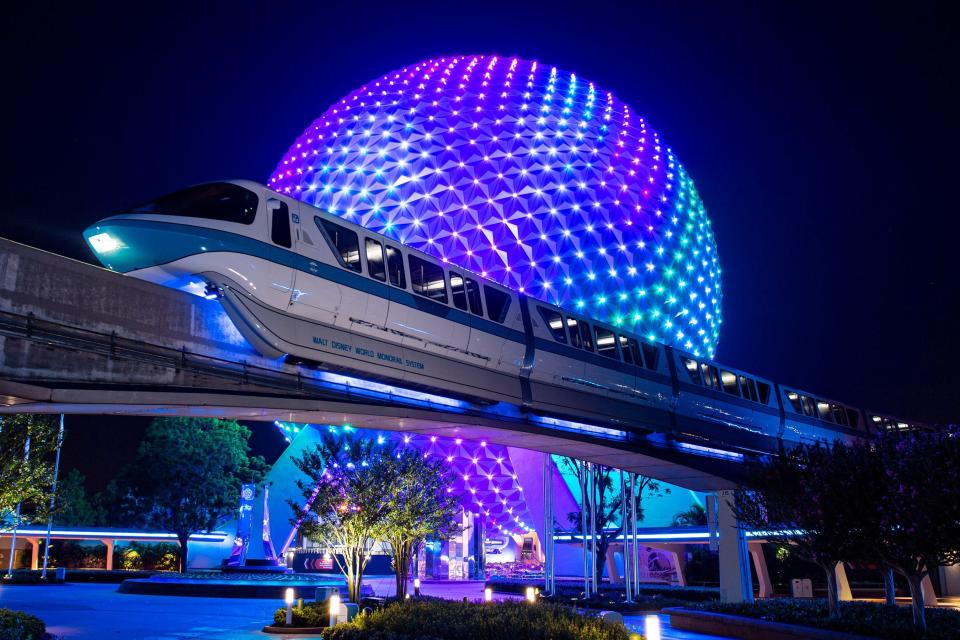 A Monorail ride offers a stunning nighttime view of EPCOT as Walt Disney World celebrates its 50th anniversary.