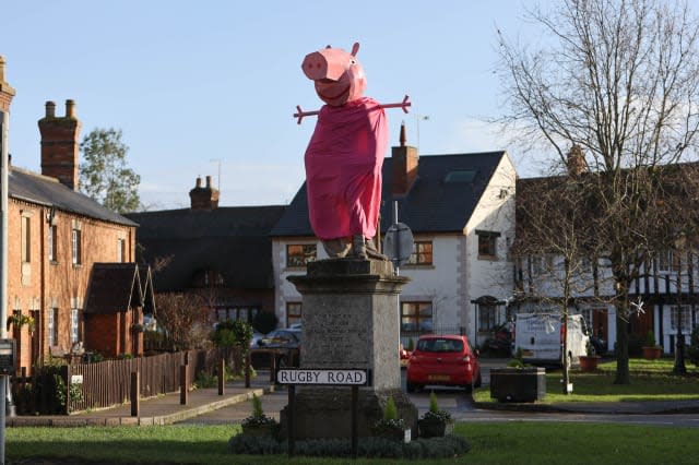 A village is hunting festive pranksters who have turned a statue of its most famous son into PEPPA PIG