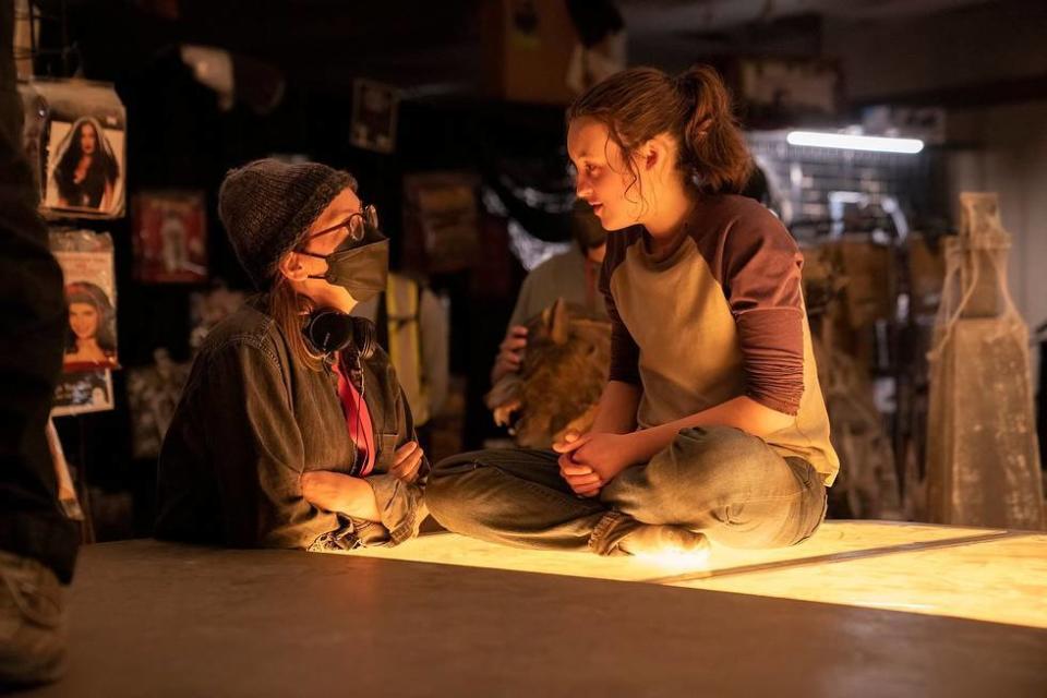 <div class="inline-image__caption"><p>Liza Johnson (left) talks to Bella Ramsey, who plays Ellie.</p></div> <div class="inline-image__credit">HBO/Liane Hentscher</div>