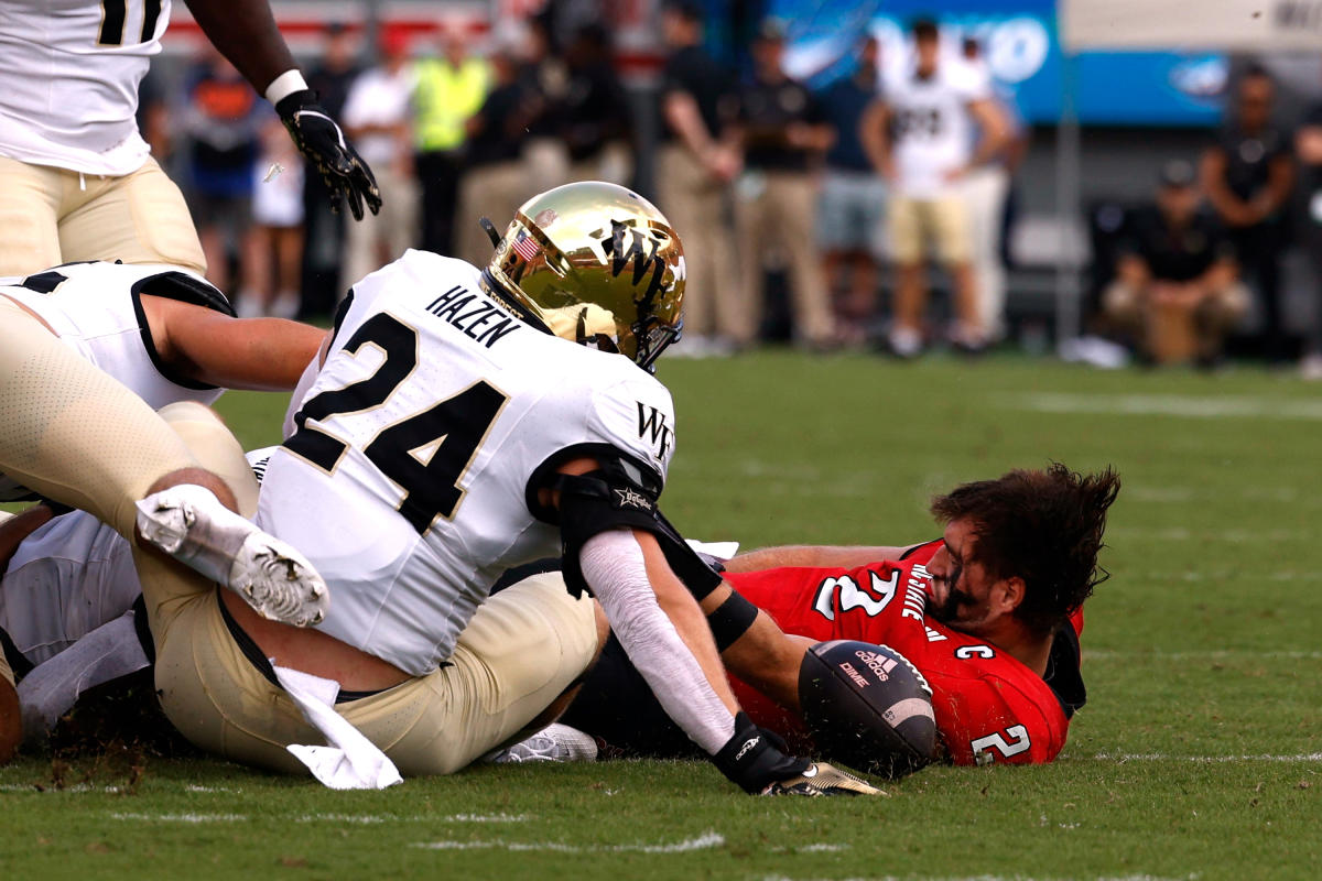 NC State QB Grayson McCall was carted off the field on a stretcher after suffering a severe blow to the helmet