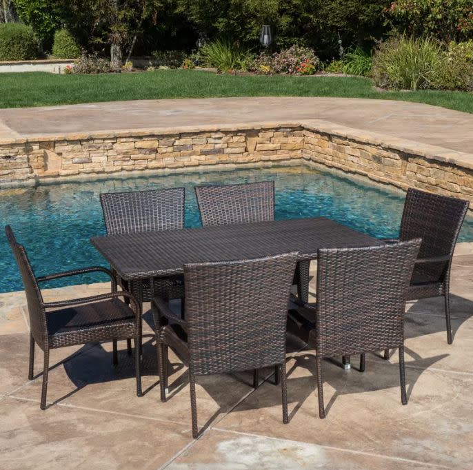 Was: $617.99<br /><strong>Now: $446.99</strong><br /><br />Get it <a href="https://www.wayfair.com/outdoor/pdp/zipcode-design-kissner-outdoor-7-piece-dining-set-zpcd5903.html" target="_blank">here</a>.