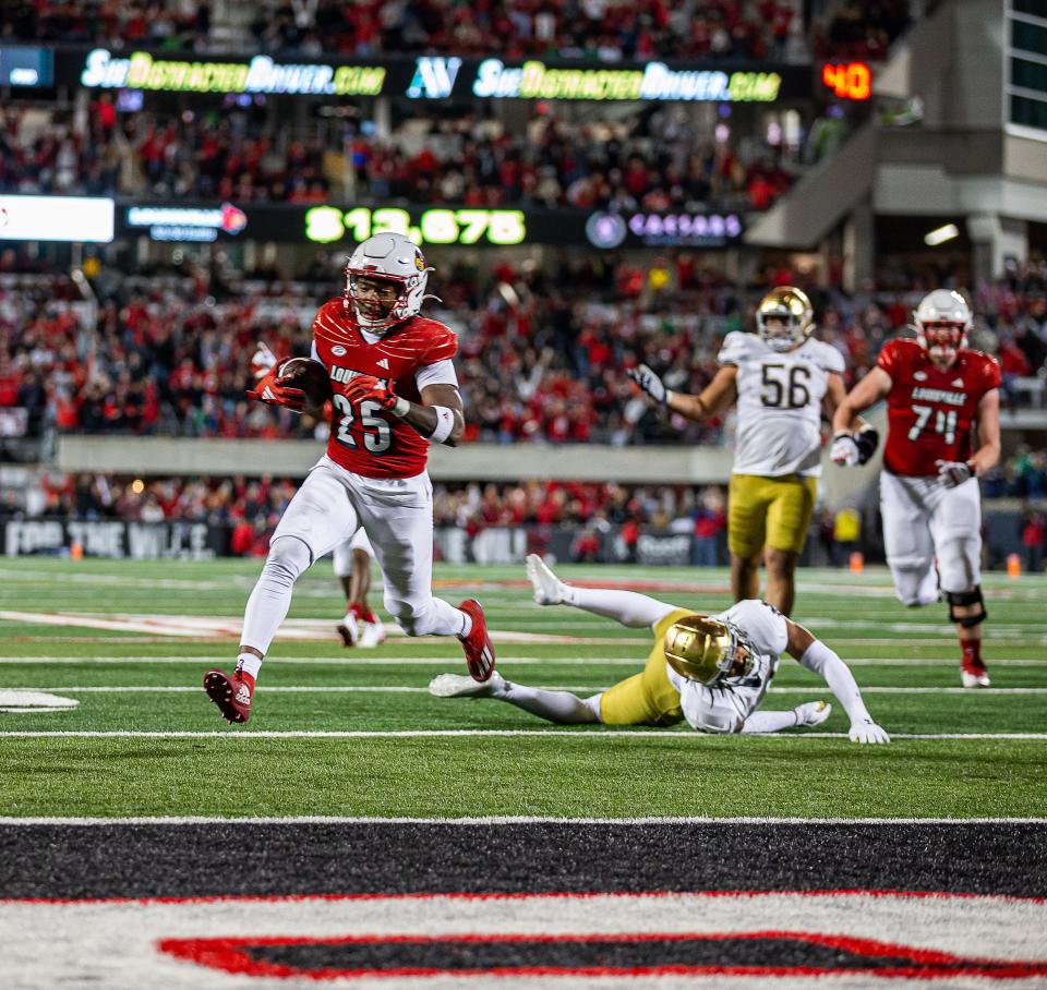 Louisville running back Jawhar Jordan scored on a 21-yard run in the fourth quarter against Notre Dame on Saturday night.