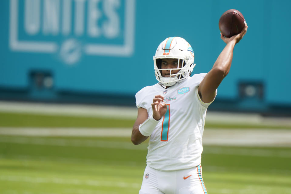 Miami Dolphins quarterback Tua Tagovailoa (1) warms up before an NFL football game against the Seattle Seahawks, Sunday, Oct. 4, 2020 in Miami Gardens, Fla. (AP Photo/Wilfredo Lee)