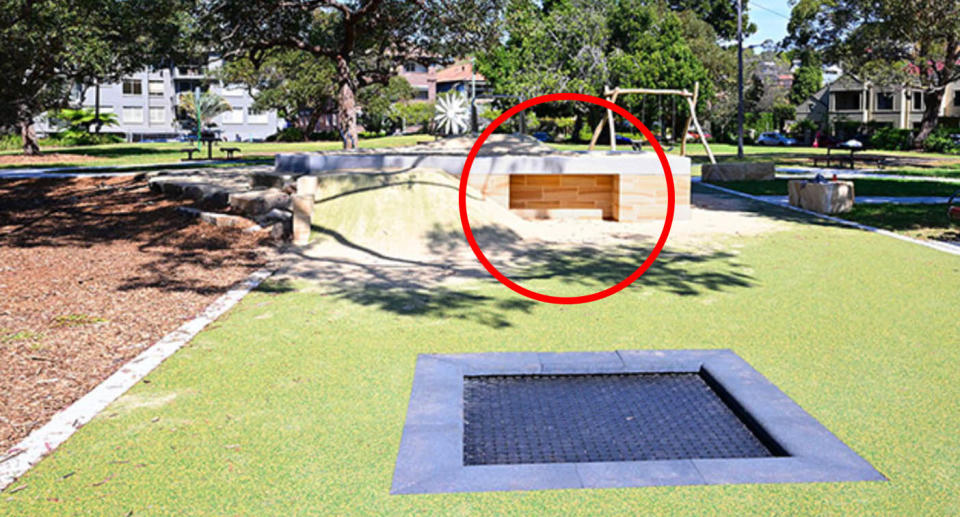 A photo of the sandpit at Hunter Park in Mosman, with a circle around the whole underneath, supposedly meant for children to park their wheelchair so that they can be as close to the sandpit as possible. 