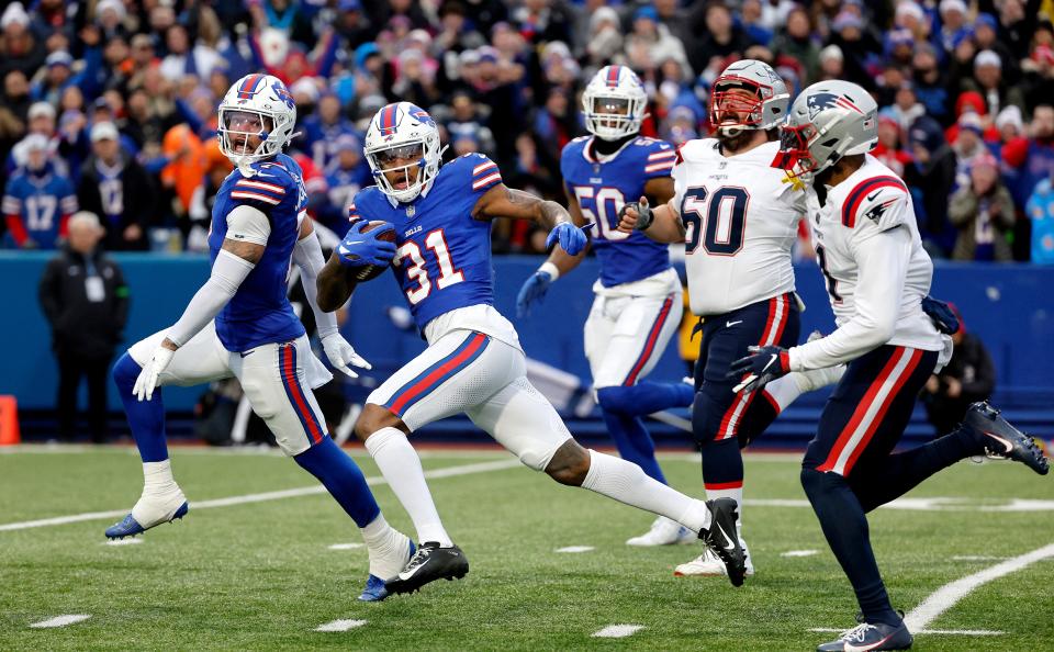 Buffalo Bills cornerback Rasul Douglas (31) scores on this interception against New England. It was Douglas’ second interception of the game. The Bills beat the Patriots 27-21.