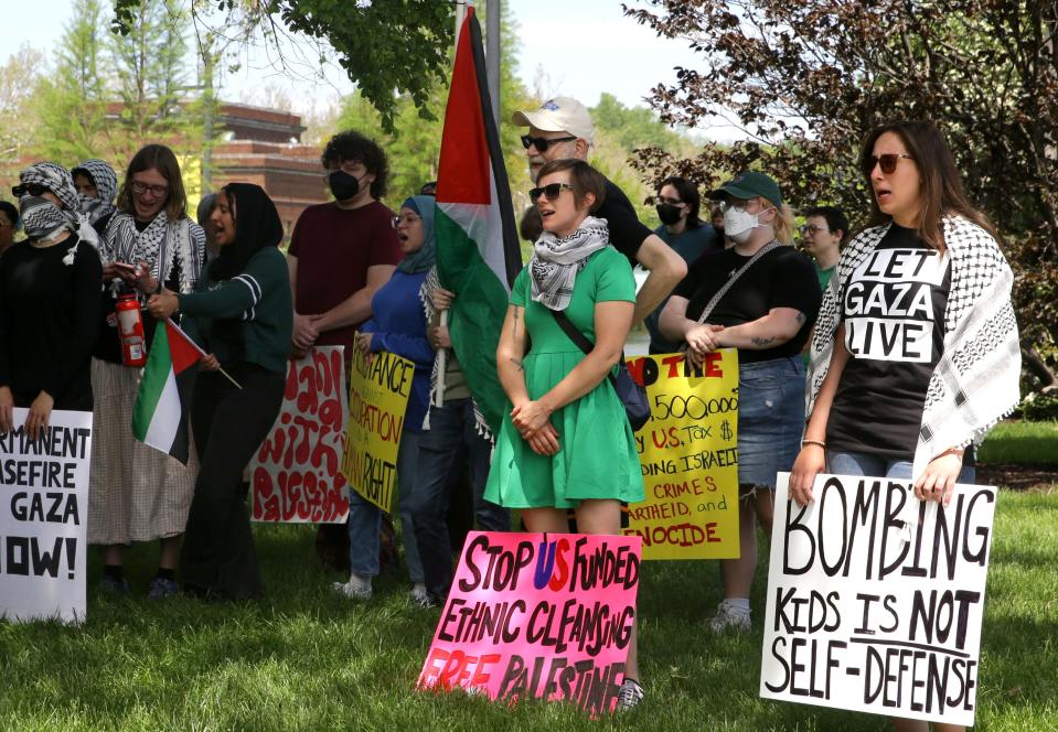 Protesters gather in Hubbard Park near the Iowa Memorial Union before marching to Carver-Hawkeye Arena calling for the University of Iowa to divest from Israel Sunday, May 12, 2024 in Iowa City, Iowa.