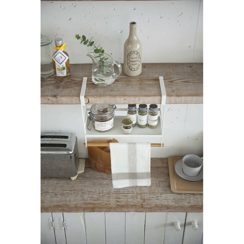 Use t<a href="https://fave.co/3owU2Hr" target="_blank" rel="noopener noreferrer">his undershelf basket</a> to store everyday spices, coffee and tea or anything else you need handy at a moment's notice. It also includes a practical towel rack. Measure to be sure it'll fit your cabinets. <a href="https://fave.co/3owU2Hr" target="_blank" rel="noopener noreferrer">Get it for $25 at Wayfair</a>.