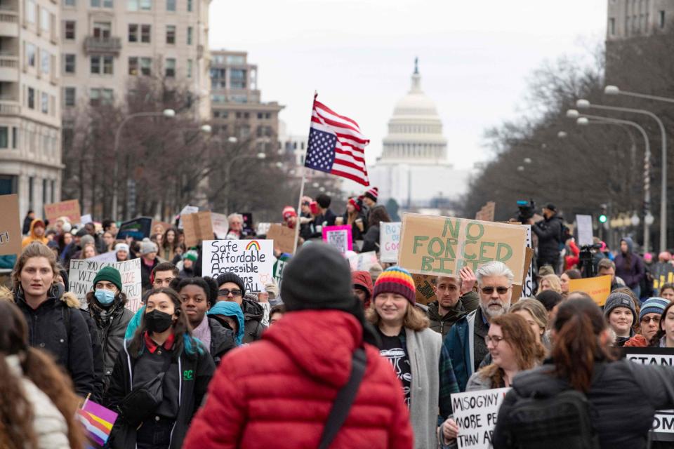 Demonstrators take part in the annual National Women's March in Washington, D.C., on Jan. 22, 2023, marking the 50th anniversary of the 1973 Supreme Court Roe v. Wade decision legalizing abortion. The Supreme Court on June 24, 2022, struck down the Roe v. Wade decision which legalized abortion, ending five decades of constitutional protections.