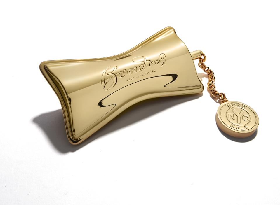 A close up of the gold keepsake tube