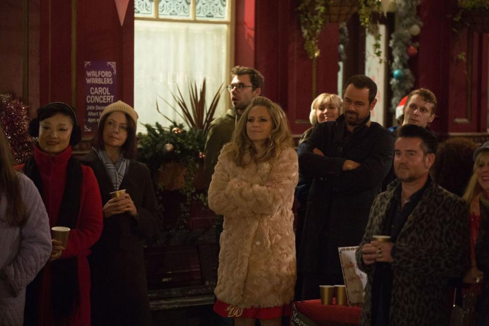 Monday, December 24: The locals watch the choir perform