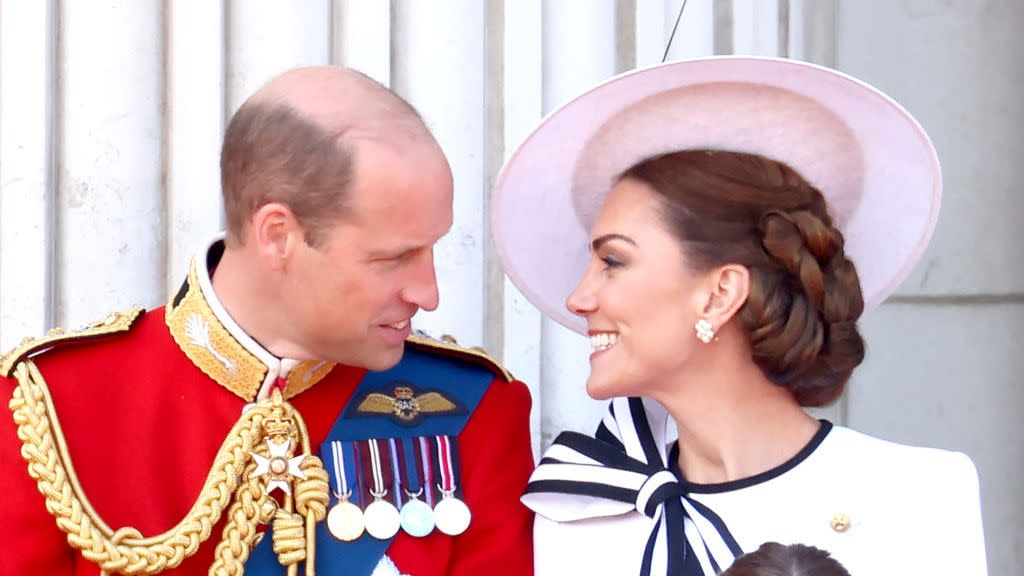 prince william and kate middleton look at one another and smile during the trooping the colour ceremony